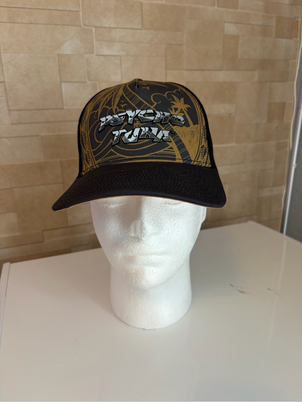 Psycho Tuna has Men's Graphic Trucker Hat - Black and Gold